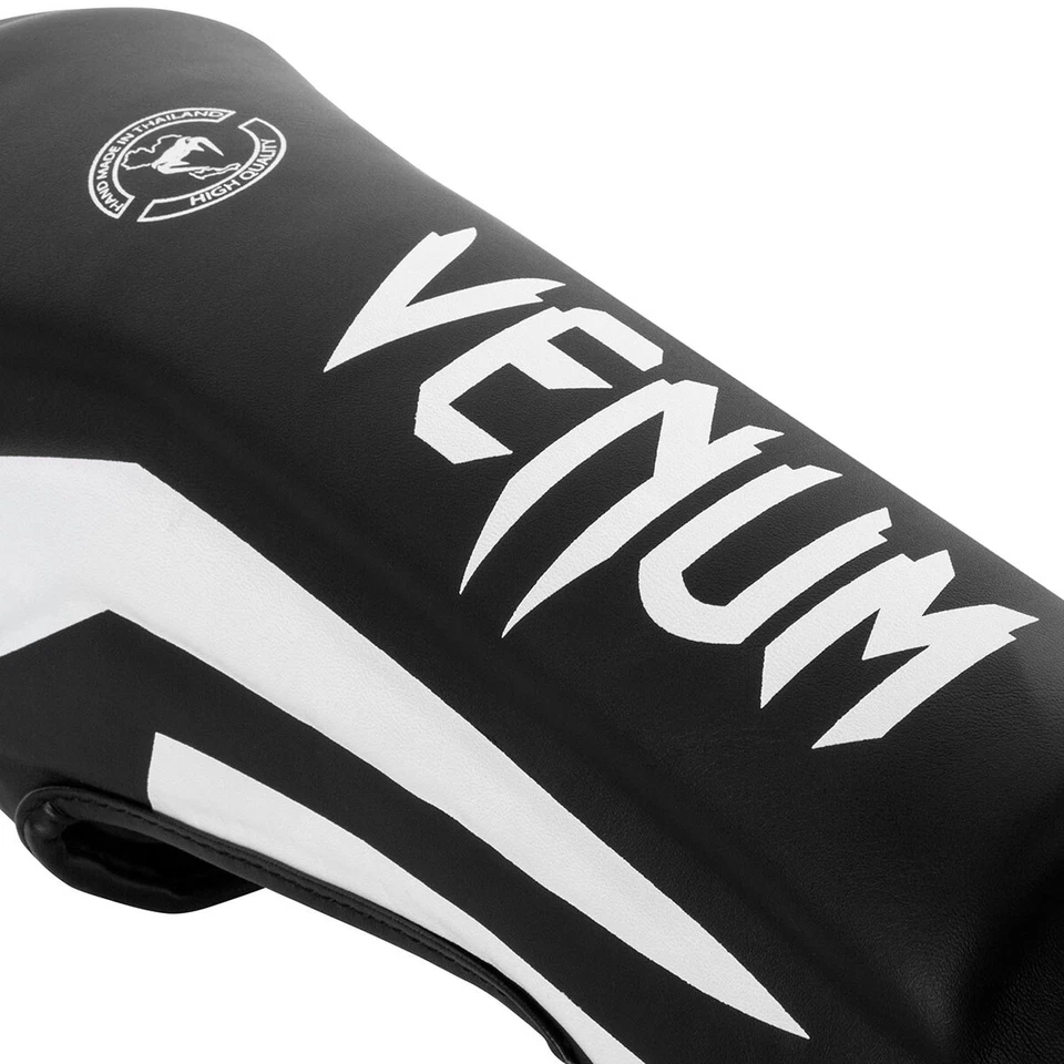 Espinilleras protectoras de pie ligeras Venum Elite MMA - negras/blancas Foto 3 de 3