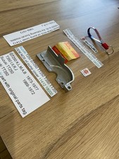 Suzuki T250 GT250 TT250 T350 TT350 OEM NOS oil pump cover 11412-18000 with tag