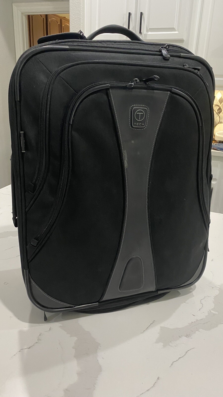 tumi tech carry on