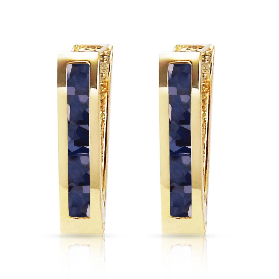 Pendientes Huggie ovalados de oro macizo de 14K de 1,3 quilates con zafiro Foto 2 de 4