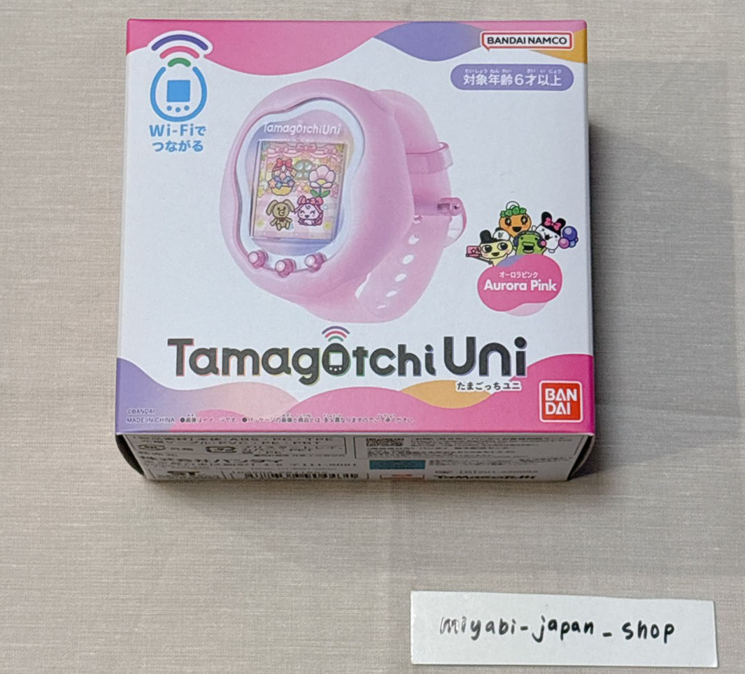 Tamagotchi UNI Tamagotchi Aurora Pink Premium Bandai Limited for