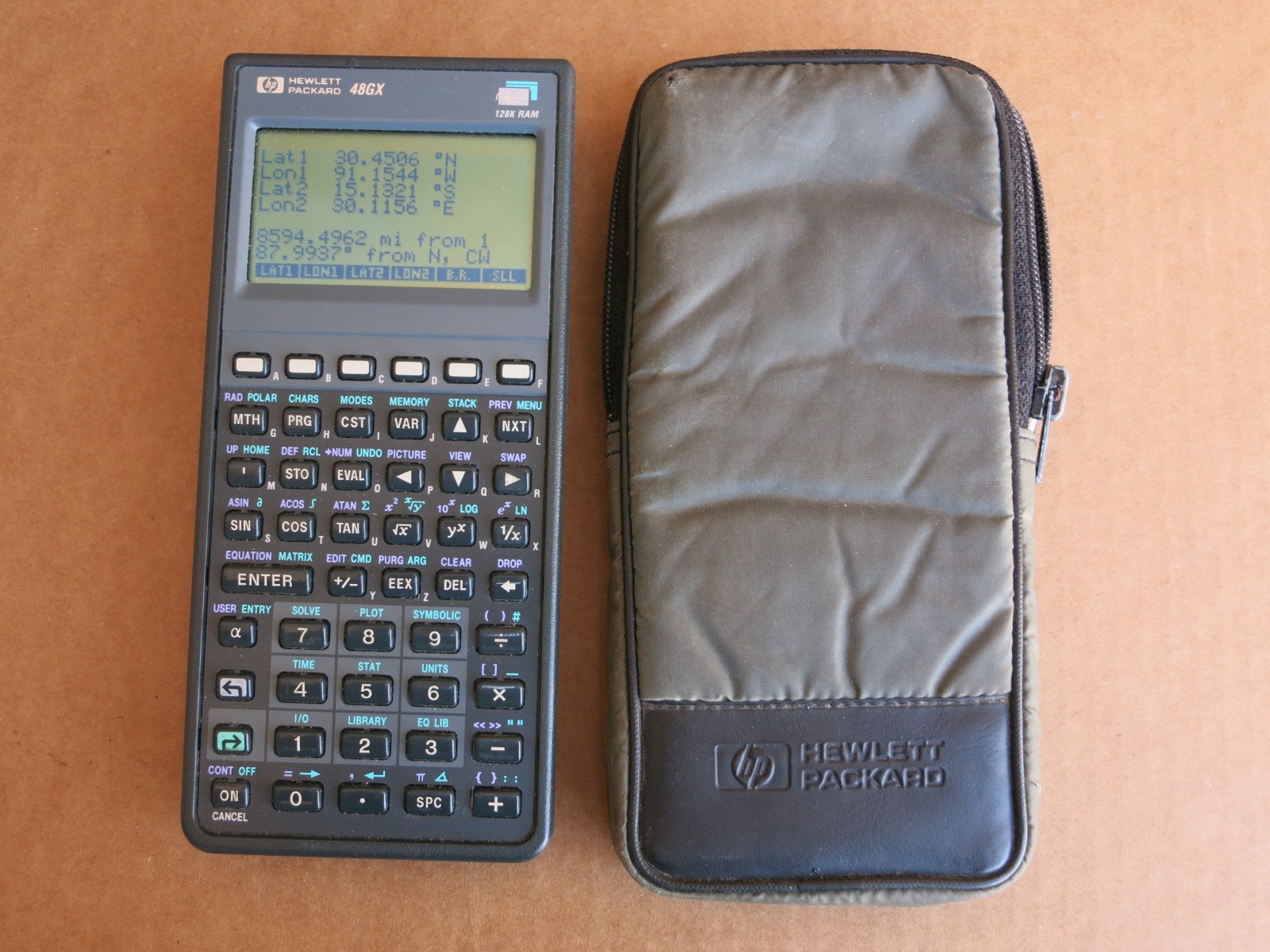 HP 48GX Graphing Calculator with a Case