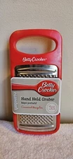 BETTY CROCKER HAND HELD RED PLASTIC FLAT SHREDDER GRATER ZESTER W/ CONTAINER