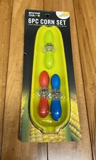 Gourmet club  6 pc corn set., 3 corn holders, 3 serving tray, mess free eating