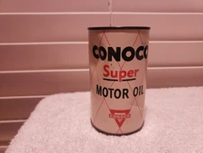 VINTAGE 1950's CONOCO SUPER MOTOR OIL 75th BIRTHDAY COIN BANK **DENTED**