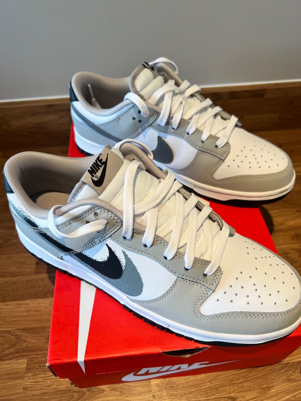 nike dunk low spray paint swoosh release date