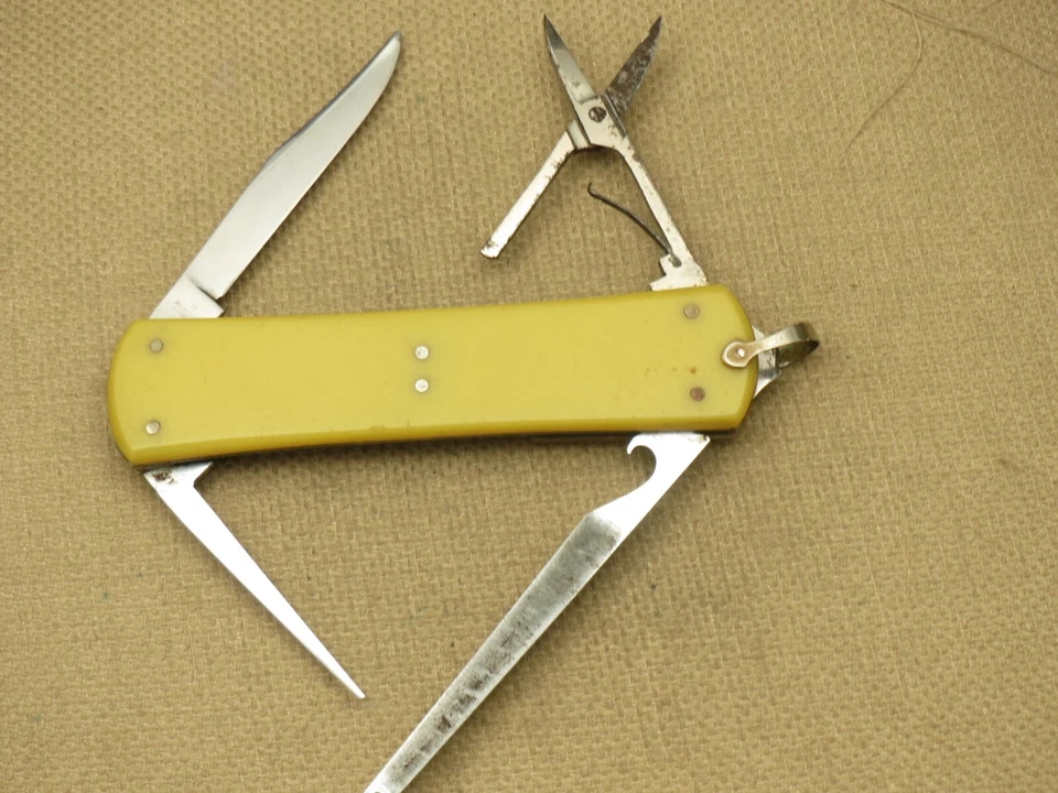 Cuchillo de pesca con mosca antiguo KA-BAR INOXIDABLE era anterior a la Segunda Guerra Mundial asas amarillas Foto 3 de 4