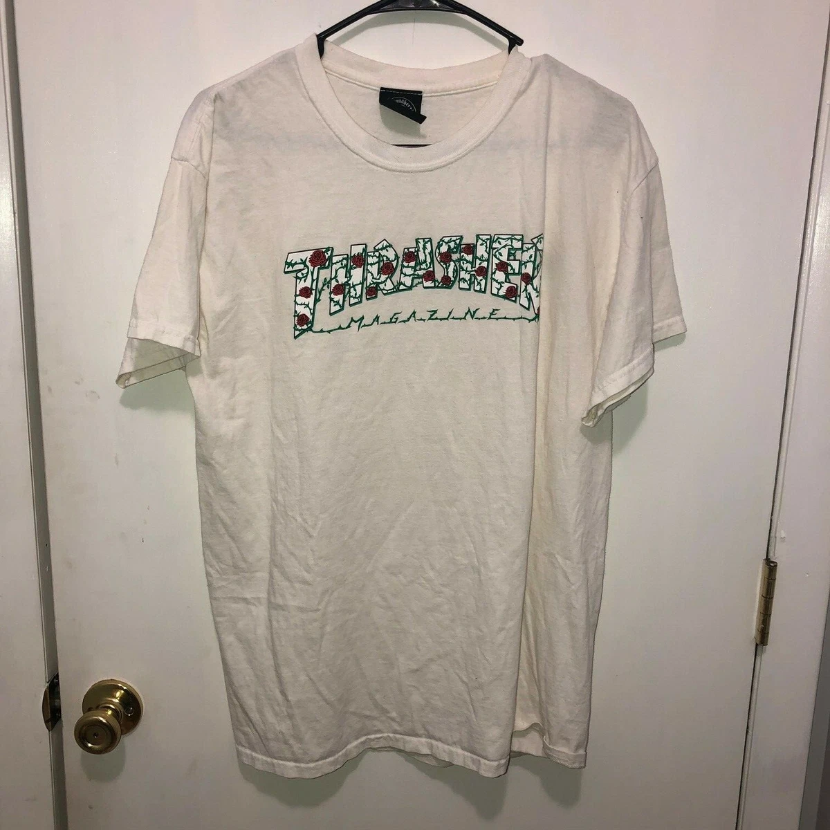 white thrasher shirt with roses