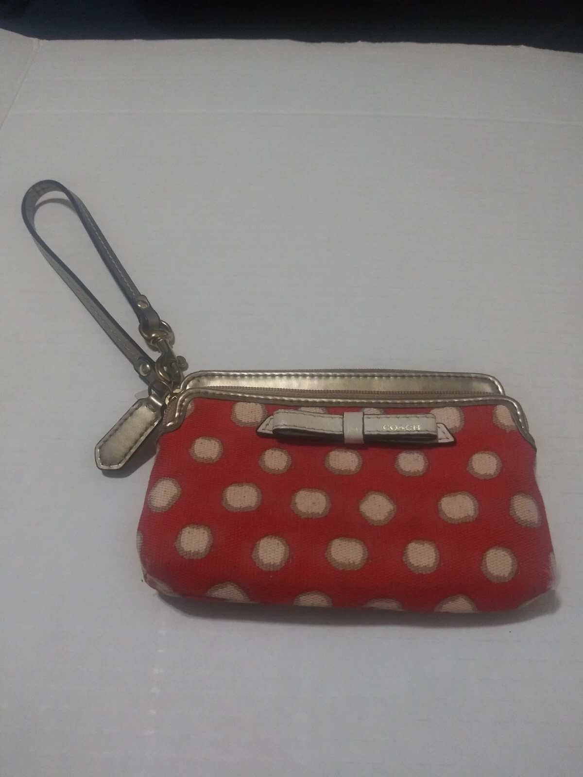 Coach Vinrage Polso rosso corallo bianco a pois