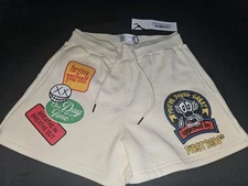 First Row Womans Size Small Graphic Fleece Shorts With Patches Cream Color