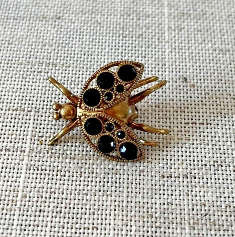 Broche, prendedor vintage J Crew tono dorado mosca o escarabajo volador con piedras negras... Foto 3 de 4