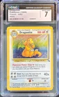 1999 POKEMON FOSSIL #4 DRAGONITE-HOLO CGC 7