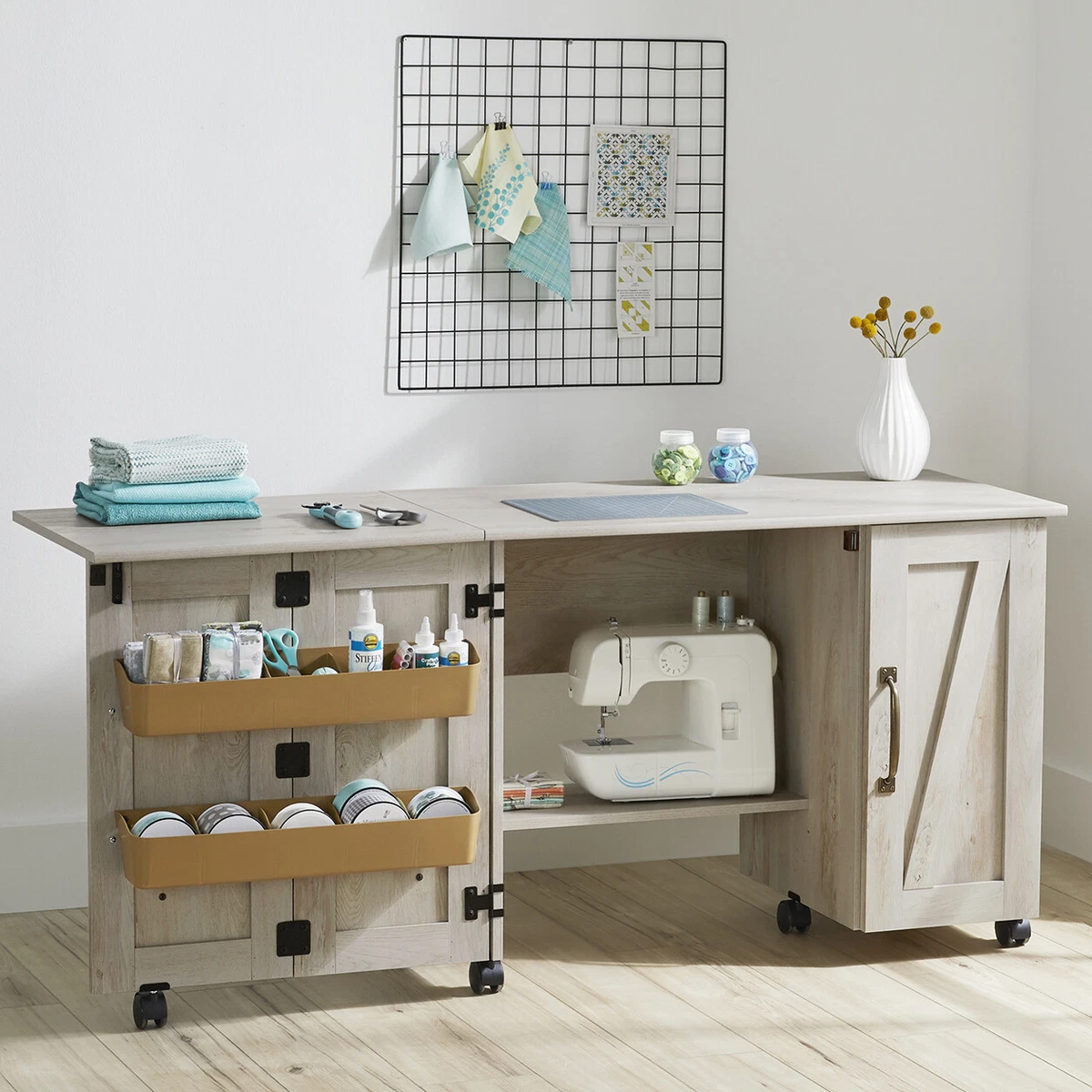 Rolling craft table with storage outlet