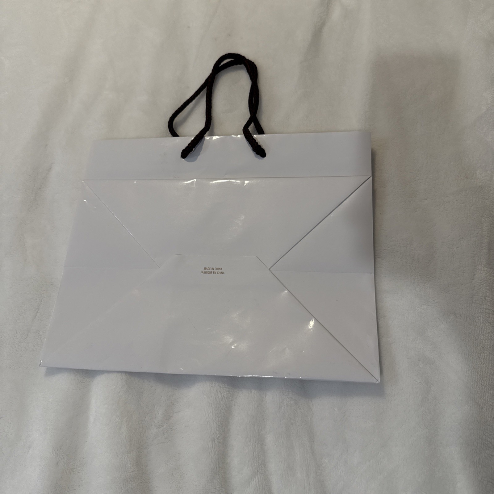 White Godiva chocolatier paper bag With Brown Straps