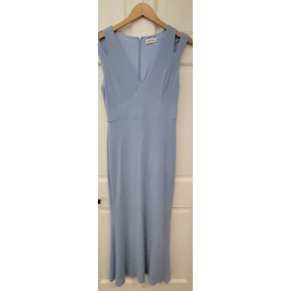 calvin klein evening dresses Womens Dress Gown Dusty Blue Sparkles Size 8 Sequined illusion sleeves elevate a classic Calvin Klein gown that opens in an alluring V at the back. Calvin Klein Womens Party Special