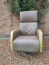 Ercol Noto reclining swivel chair - brown hide with solid oak arms, metal frame