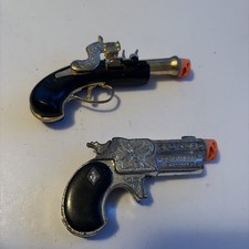 2 Vintage Toy Gun Hubley Derringer And Unbranded Pirate Muzzleloader Pistol