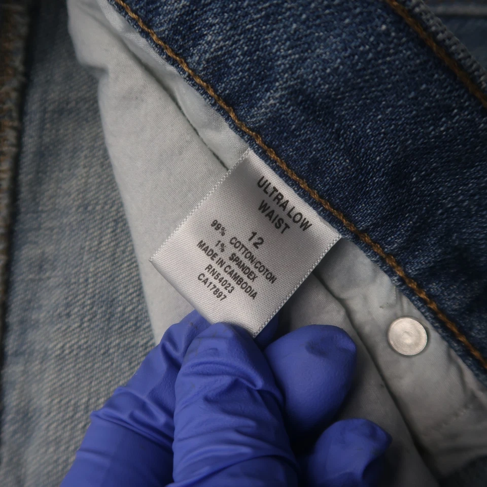 Minifalda vaquera vintage Y2K antigua azul marino 12 tiro ultra bajo jean desgastado años 2000 Foto 4 de 4