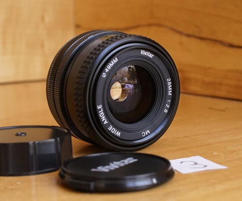 1 lente gran angular Canon FD 28 mm F2,8. Elección de 6 lentes todas G Con - Imagen 14 de 39