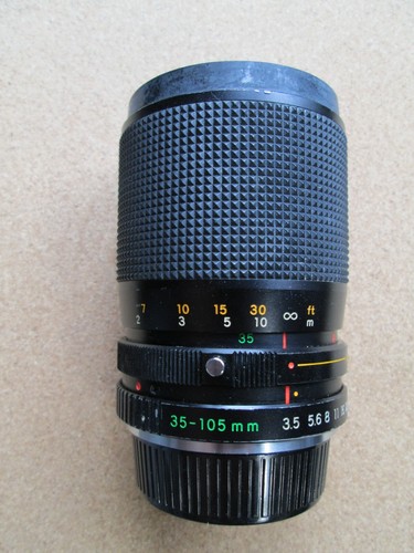 Yashica lens, ML 35-105mm f3.5-4.5 Macro. Yashica/Contax mount. Made in Japan.