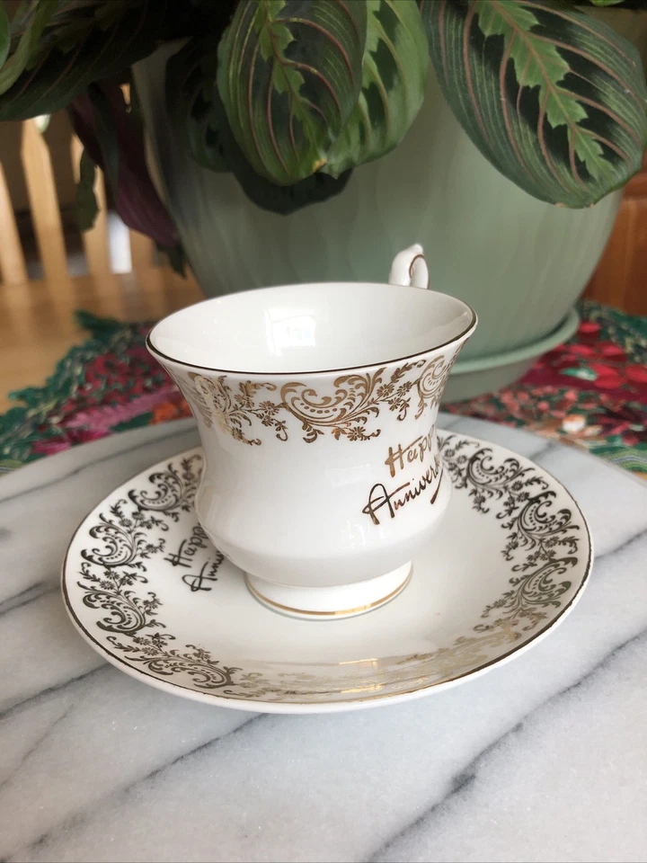 Taza y platillo de porcelana dorada feliz aniversario Itsm W Foto 2 de 4