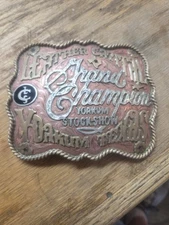 Leo Smith Silver Star Yoakum Stock Show Grand Champion Copper Brass Belt Buckle