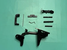 USED OEM GLOCK 23 GEN 4 LOWER PARTS TRIGGER SLIDE STOP EJECTOR PINS MAG CATCH 32