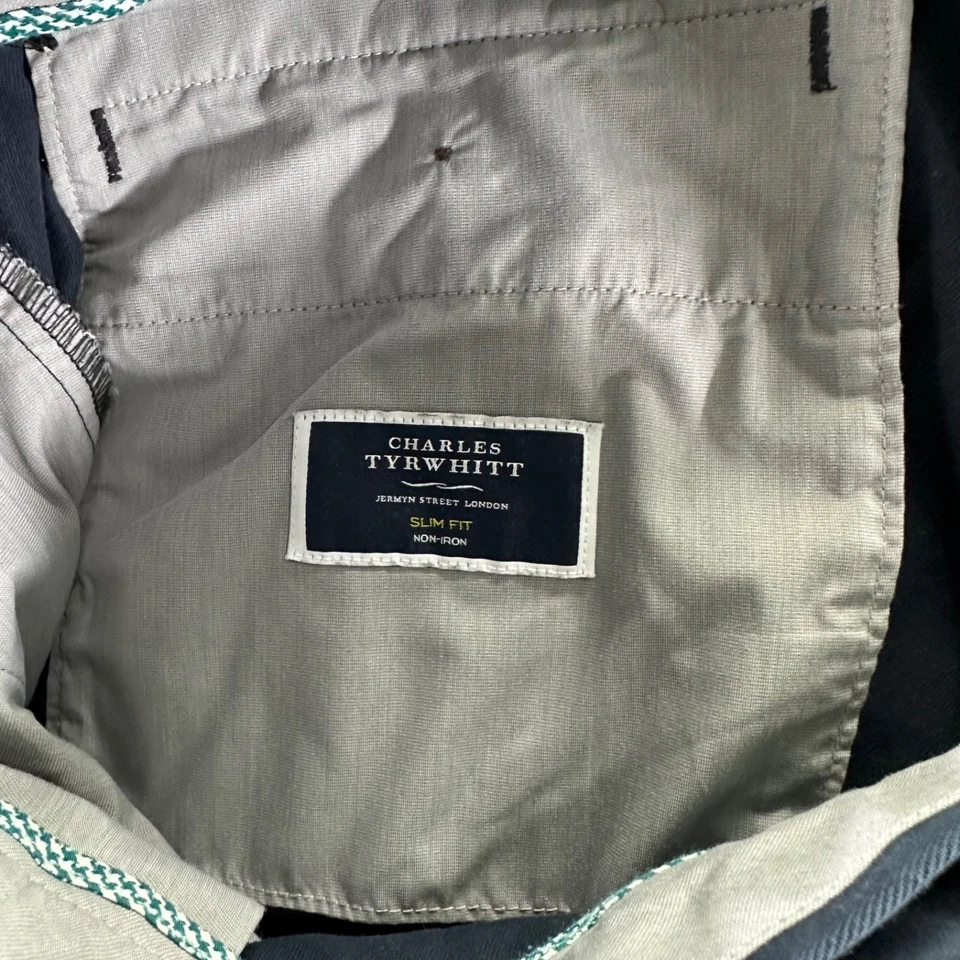 Pantalones chinos Charles Tyrwhitt para hombre 34x34 azul marino algodón elástico ajustados sin hierro Foto 3 de 4