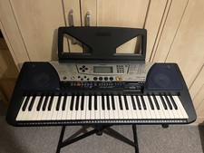 Yamaha Portatone PSR-340 61-Key Electronic Keyboard Black With Stand