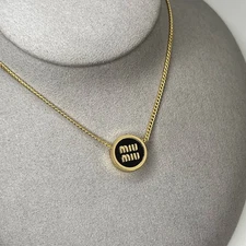 Authentic MIU MIU gold and black enamel women's necklace
