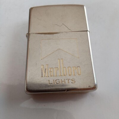Zippo Marlboro Logo Etched Sculpture Silver Single-Sided Zippo Marlboro Logo Etched Sculpture Silver Single-Sided