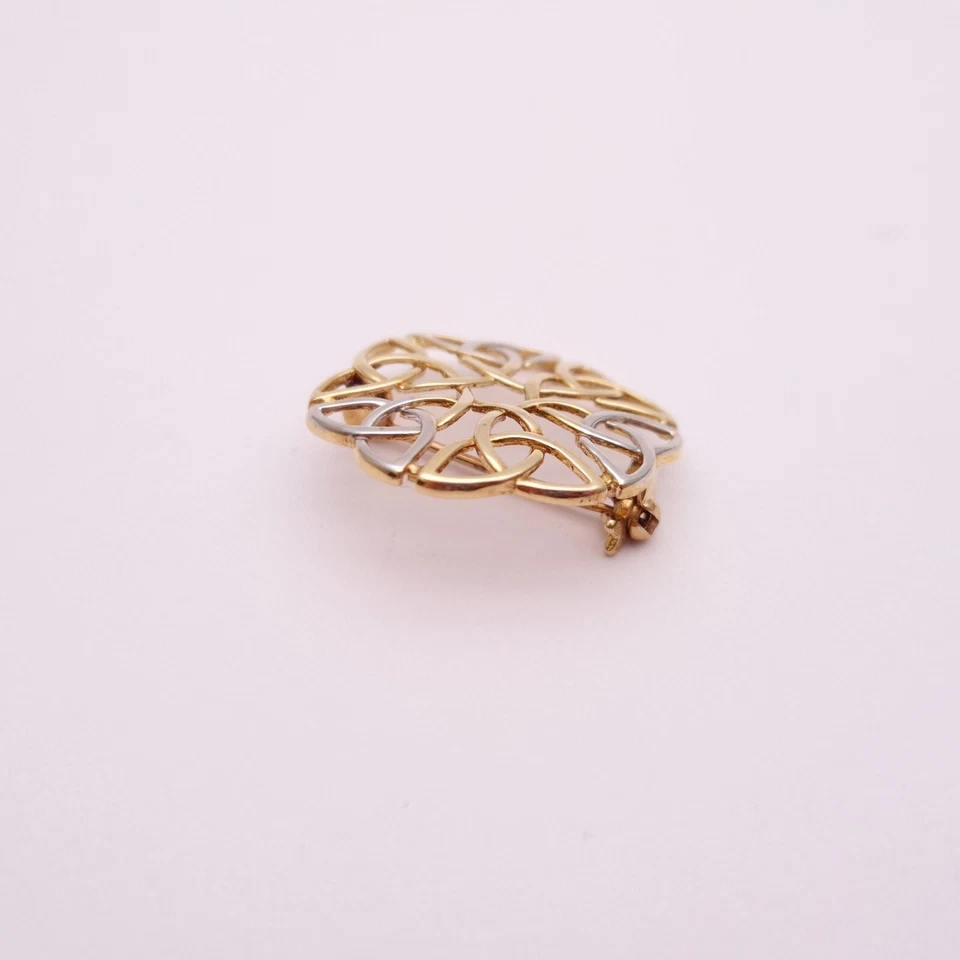 Broche estilo nudo celta oro amarillo y blanco bicolor 9ct Foto 4 de 4