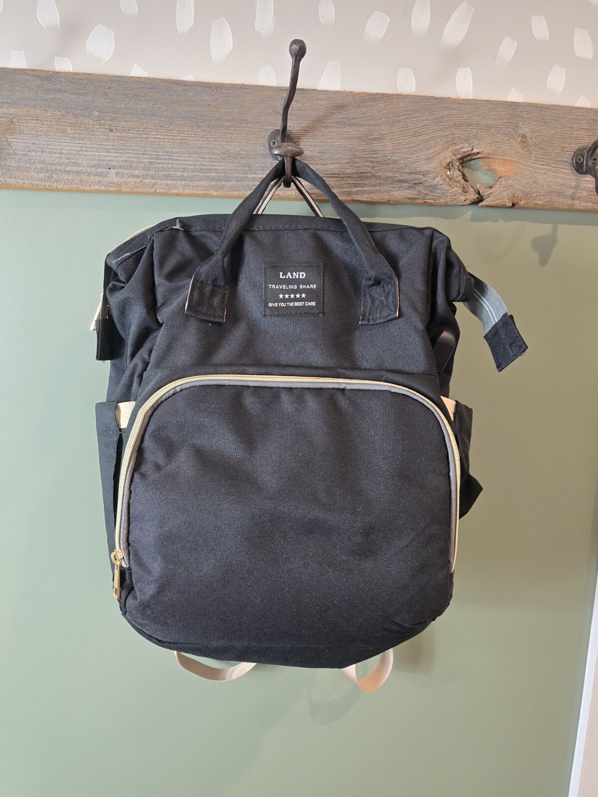 Diaper bag for traveling, black in color-image