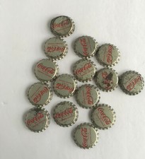15 Silver Coca Cola unused bottlecaps
