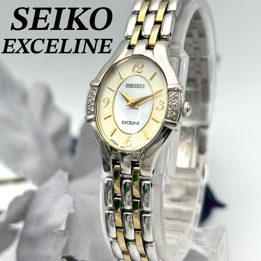 Seiko Exceline Quartz Watch Silver Gold Oval Diamond Bezel 6.3in
