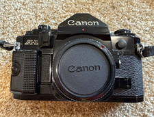 Canon A-1 A1 35mm SLR Film Camera w/ Canon FD 35-70 mm, 24 mm lens SSC, flash