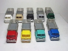 MODEL MOTORING  3 STAKE TRUCKS W/GRAY STAKES. MOLDED PLASTIC . SUPER SALE !!!!
