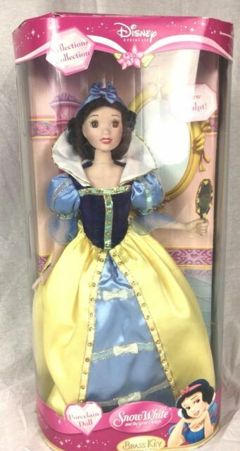 snow white porcelain doll brass key