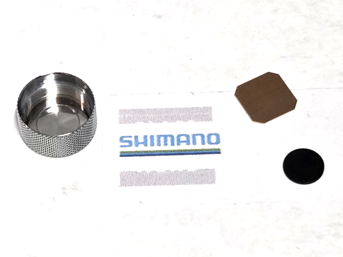 Shimano BNT1209 Cast control cap + BNT1696 Spacer 