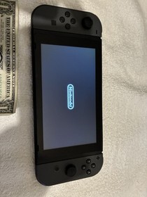 Nintendo Switch with 3 Games,  A Second Controller, A 256GB SD card