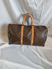 Louis Vuitton Keepall 50 Travel Bag small rip alongside zip see pics 33