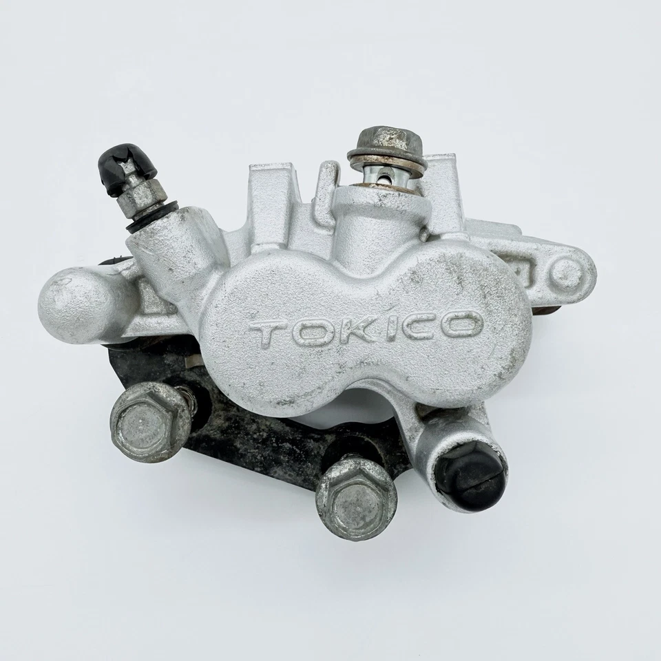 Pinza de freno delantera con pastillas Suzuki RM 85 85 85L 2002-2015 OEM Foto 2 de 4