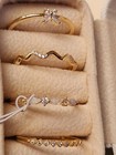 gold Adjustable   Cubic Zirconia  Case 4set New, can be used for toe rings . — photo 1