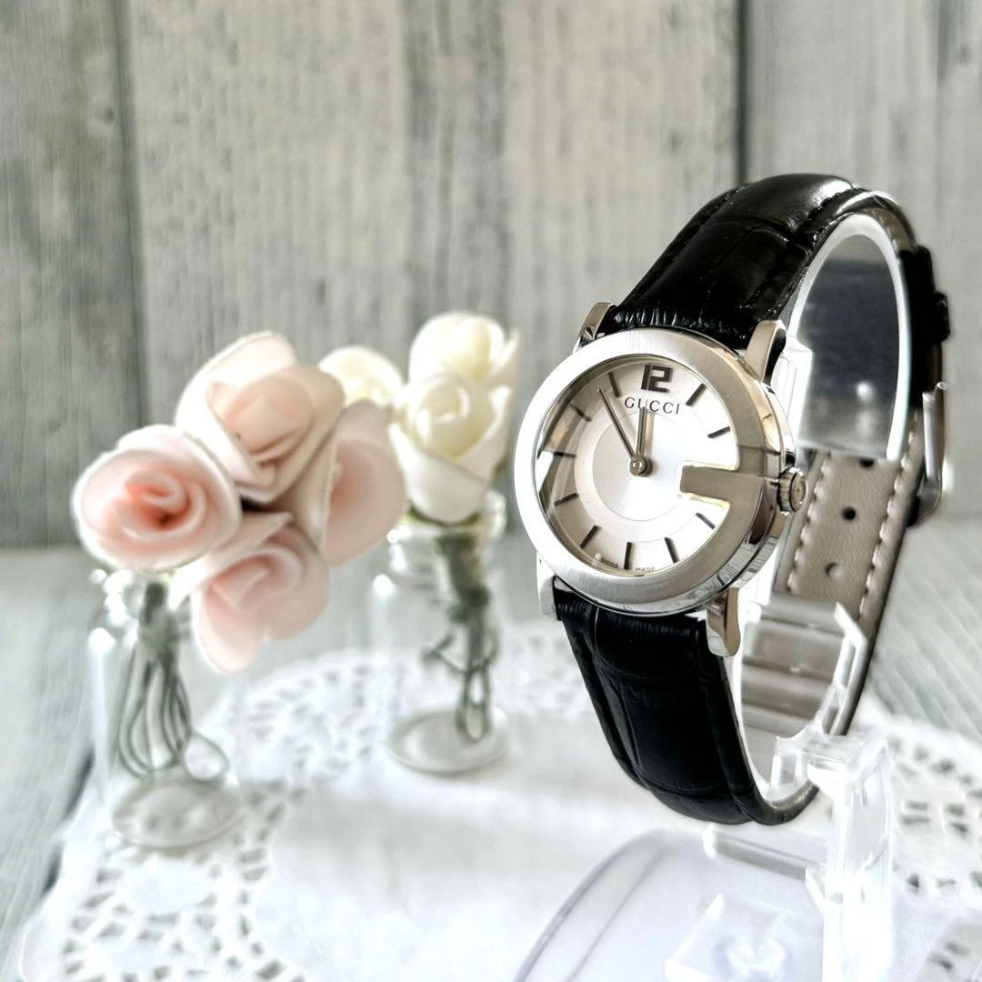 Montre Gucci G ronde 101L cadran blanc bracelet cuir noir