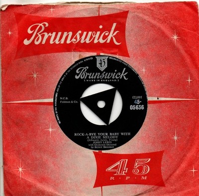 Jerry Lee Lewis:Rock-a-bye your baby with a Dixie melody/Come rain or come shine