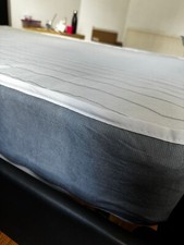 double bed -dark grey colour, 199*143cm in size and assembled with s