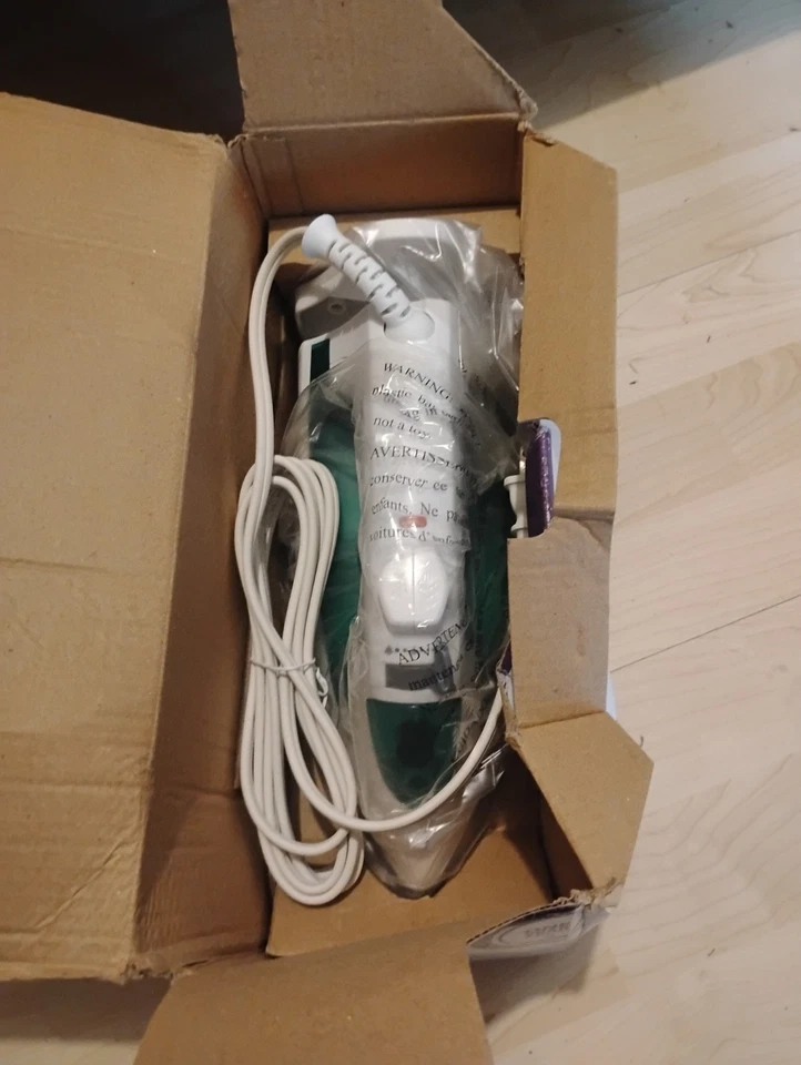 Plancha envolvente de cable RIVAL~~Control de vapor~~Función de pulverización~~Indicador de temperatura Foto 2 de 3