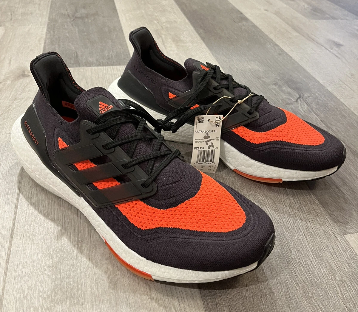 Adidas black sales orange shoes