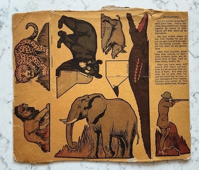 VINTAGE POST TOASTIES CEREAL BOX CUT OUT PREMIUM SAFARI HUNTER ELEPHANT ANIMALS