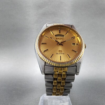 KOKUSAI SANGYO M‐36 GOLD (24K) Seiko SQ President Watch men 36mm Gold Dial Two Tone Daydate